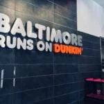 Sign inside Dunkin' at Belvedere Square that reads "Baltimore Runs on Dunkin".